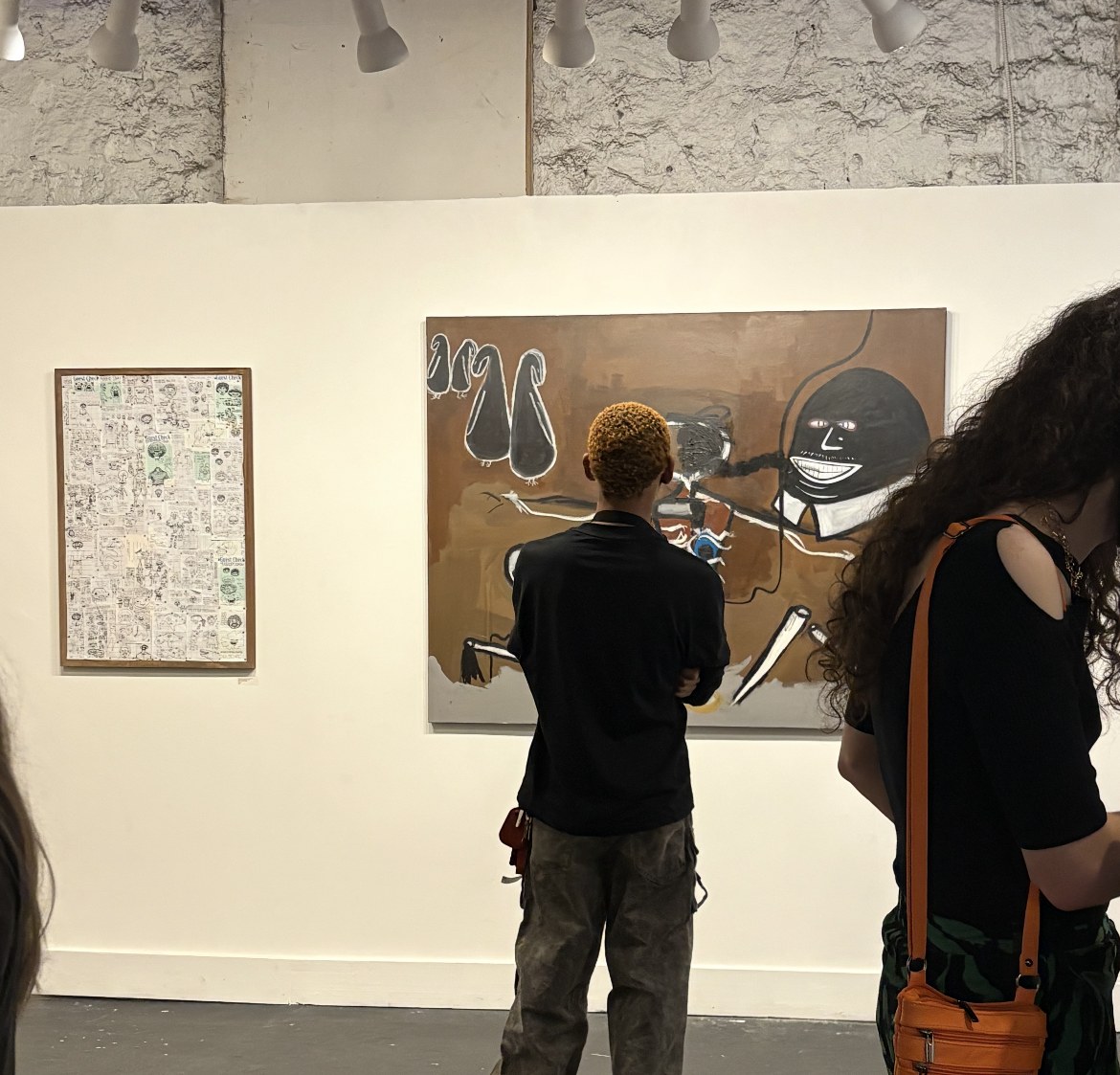A visitor standing in front of Dead Riding Dead at HEARD 2